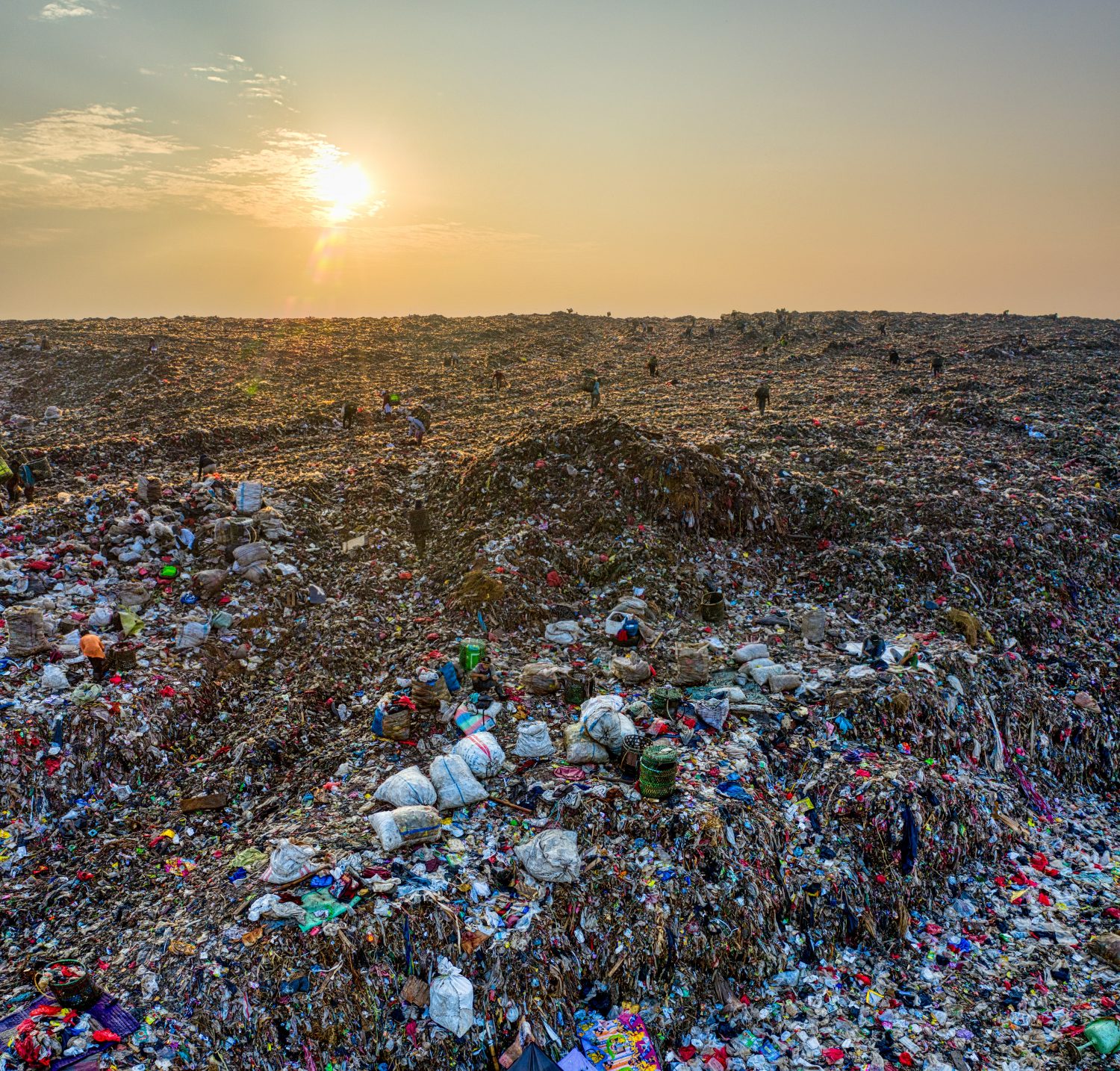 A rubbish dump at sunset