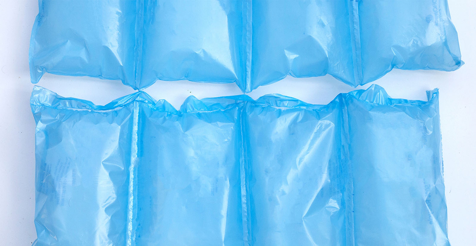 Plastic air bags illustrating the PPWR empty space rules.