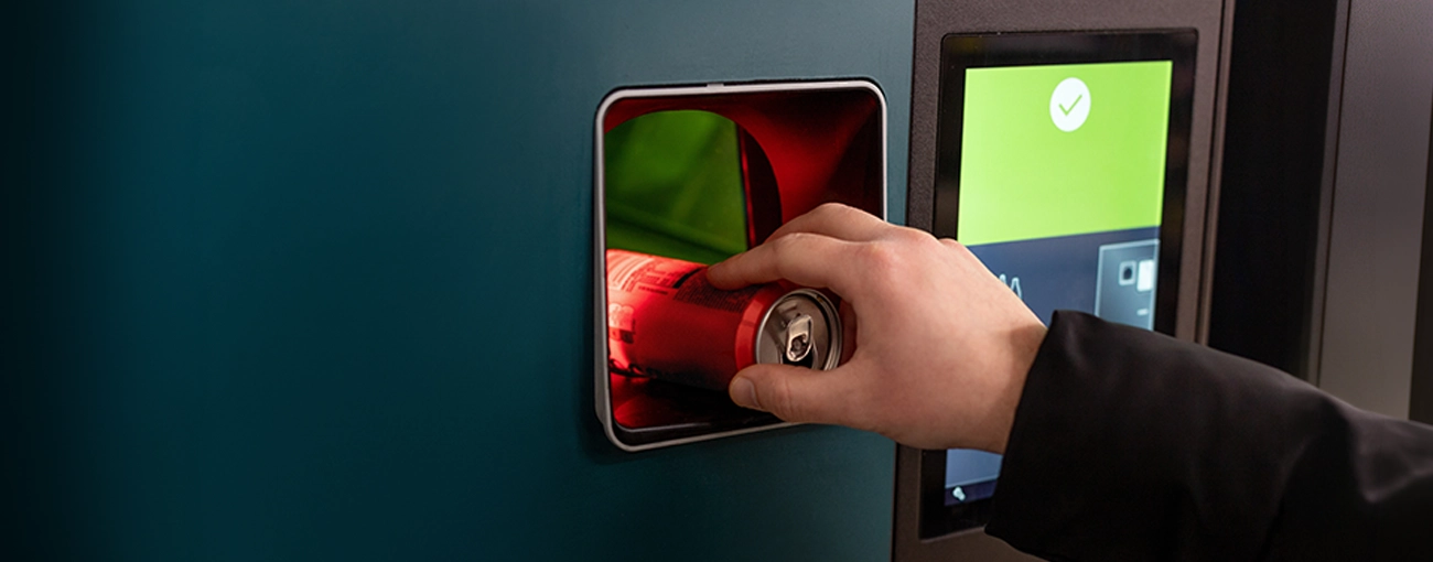 UK Deposit Return Scheme illustrated by a reverse vending machine.